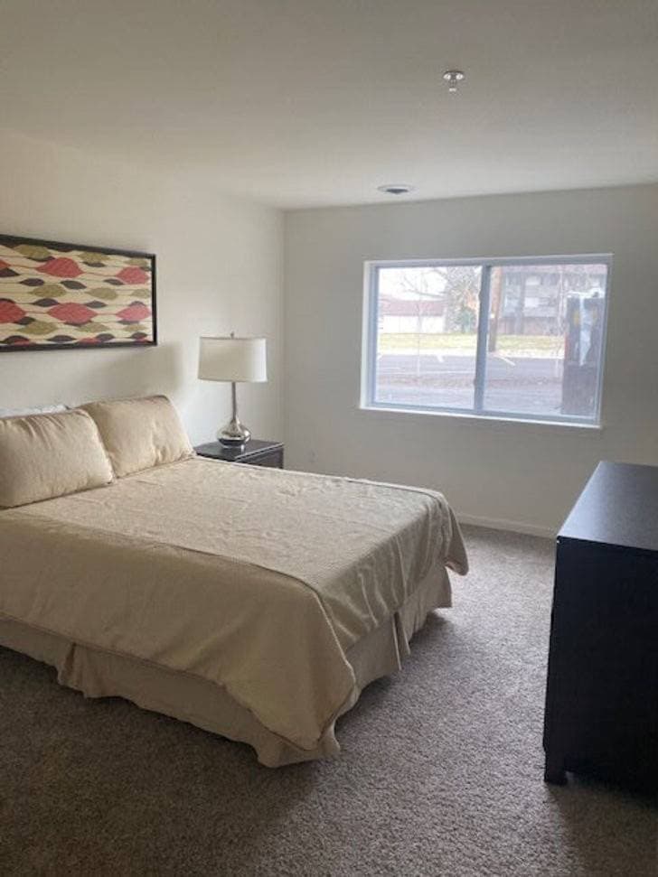 Furnished Layton 1900 bedroom with large window