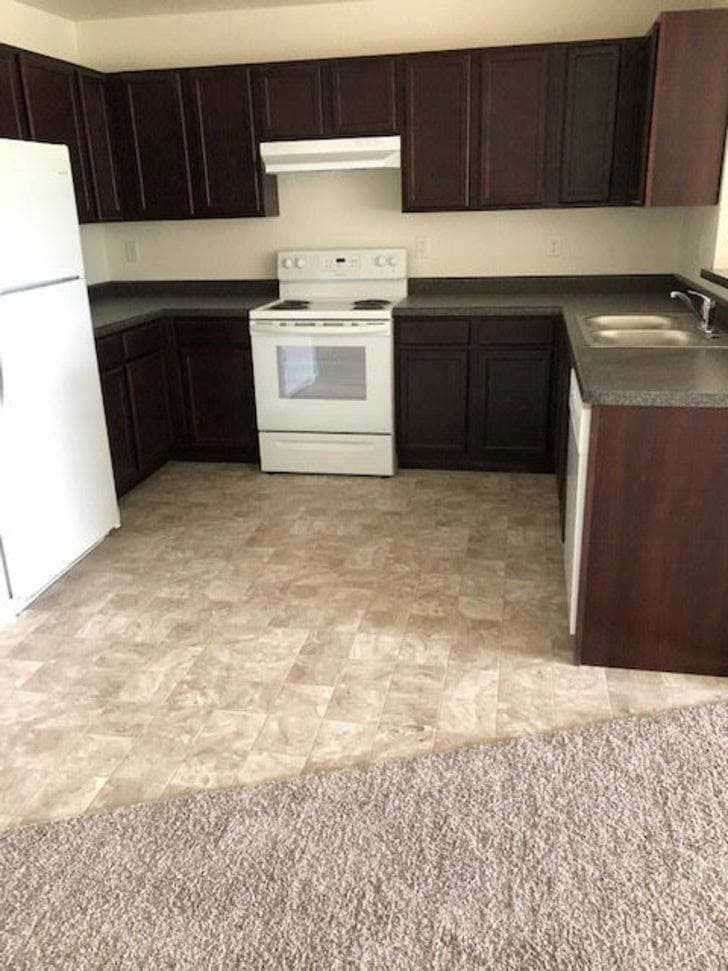 Layton 1900 kitchen with dark cabinets and countertops