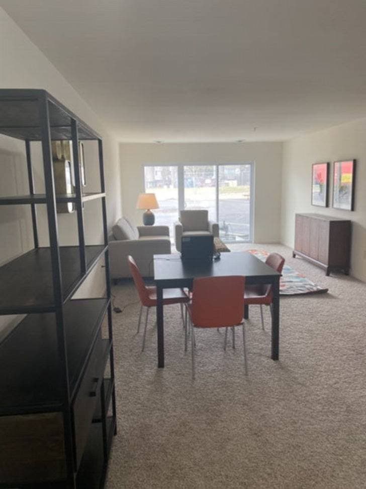 Furnished Layton 1900 apartment living and dining area