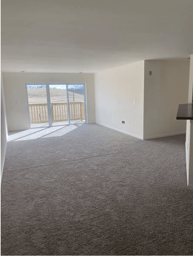 Layton 1900 open concept living room with patio access